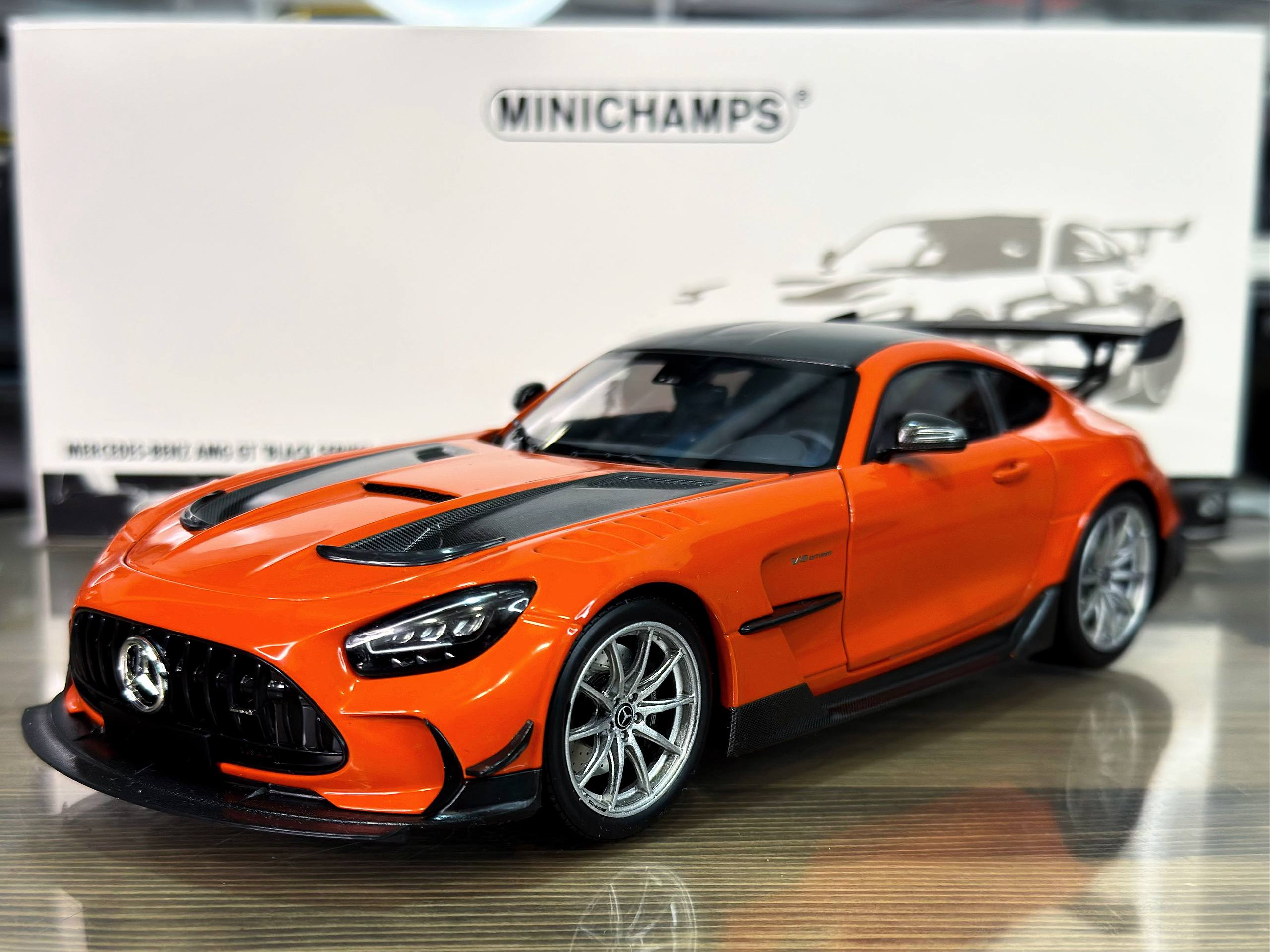 110032024 Minichamps Mercedes AMG GT Black Series 2021 Orange/Silver Wheels 1:18