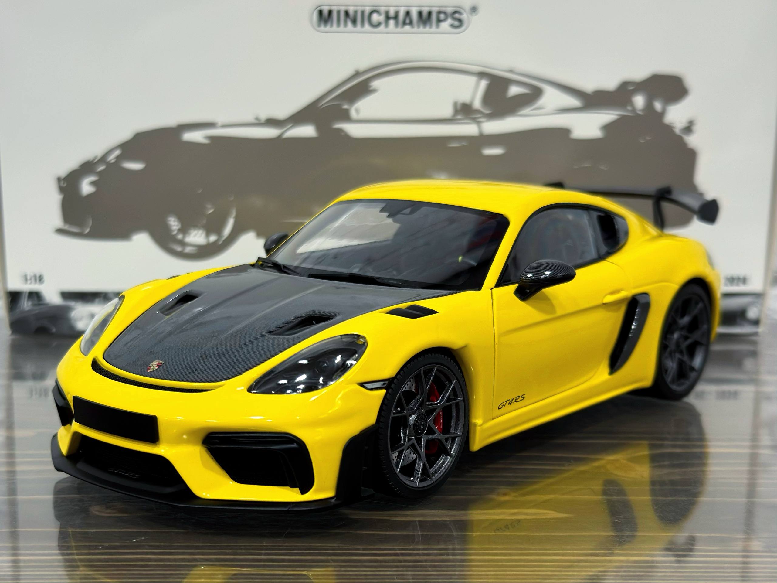 110062124 Minichamps Porsche Cayman GT4 RS 2024 Yellow W/Weissach Package 1:18