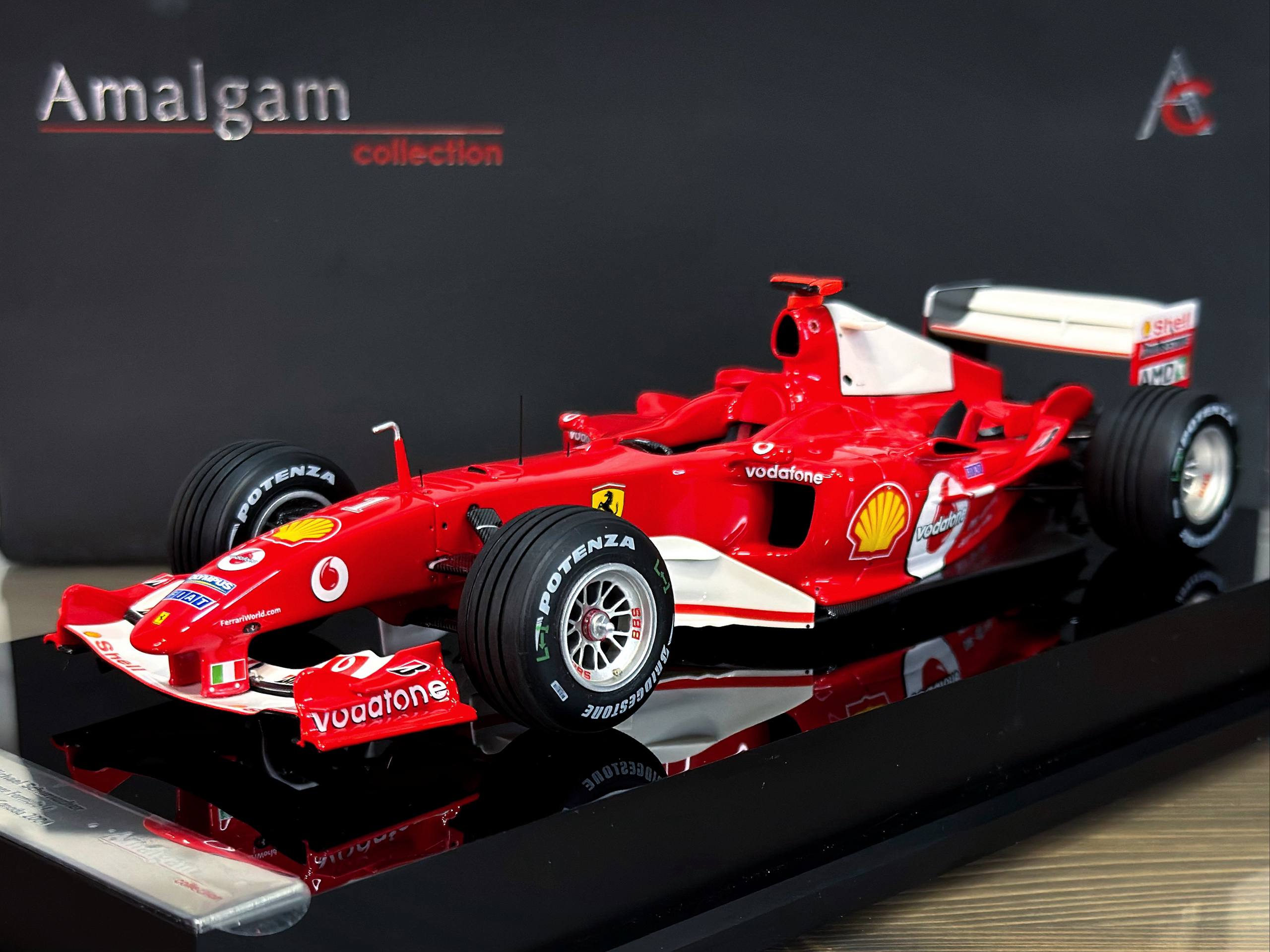 M6050-254 Amalgam Ferrari F2004 Michael Schumacher Winner Formula 1 Grand Prix Du Canada 2004 Red 1:18