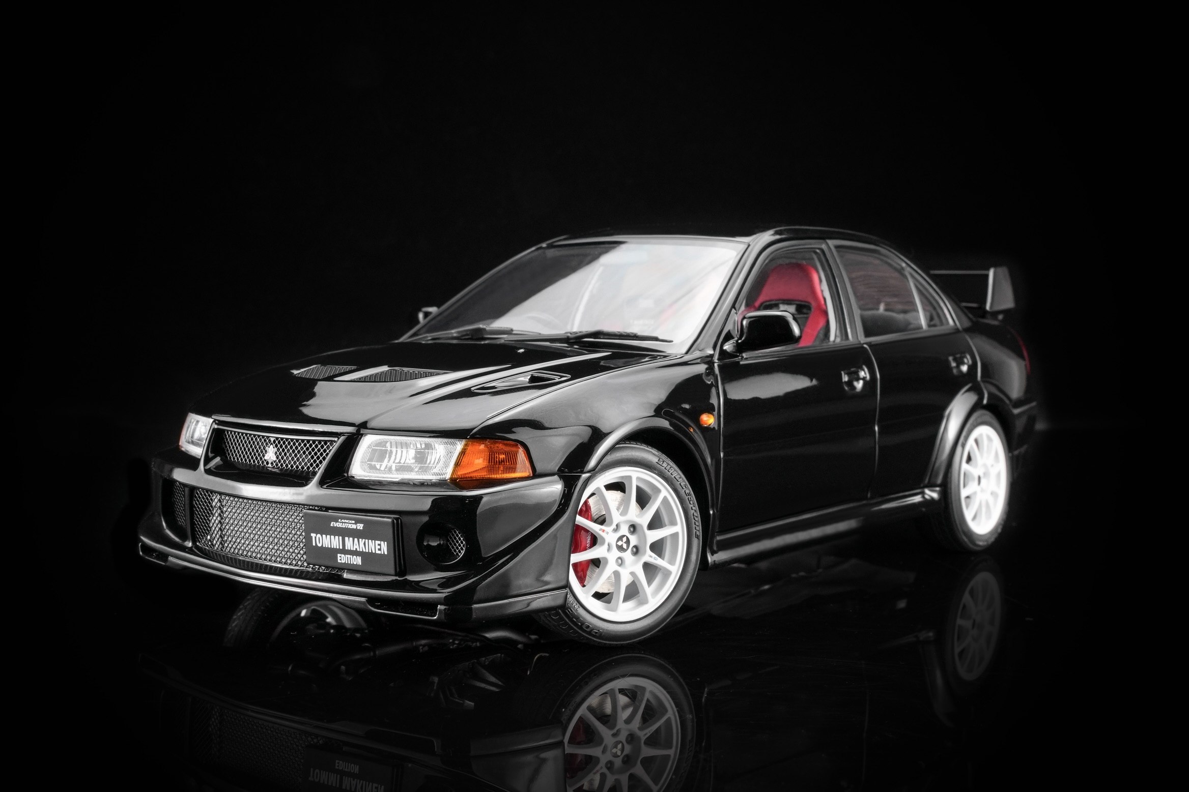 M84303 Motorhelix Mitsubishi Lacer Evolution VI GSR T.M.E Pyrenees Black 1:18