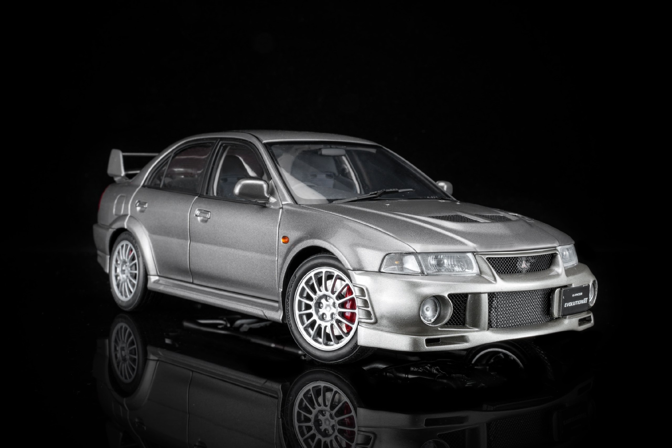 M84203 Motorhelix MItsubishi Lancer Evolution VI G.S.R Satellite Silver 1:18